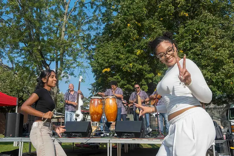 Dancing during a performance by Alex Torres & his Latin Orchestra
