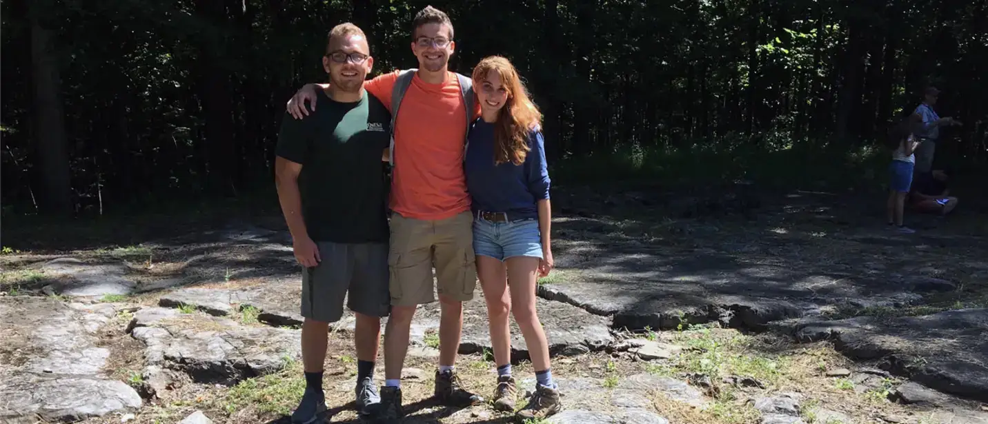 A trio of students pose for a snapshot during GEOFYRST.