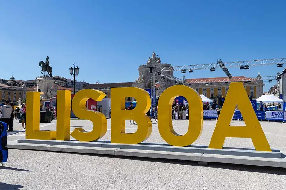 Large yellow letters spell out Lisboa in Portugal.