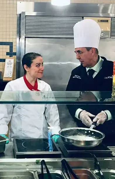 Julia smiles at the Wilbach Dining Hall chef.