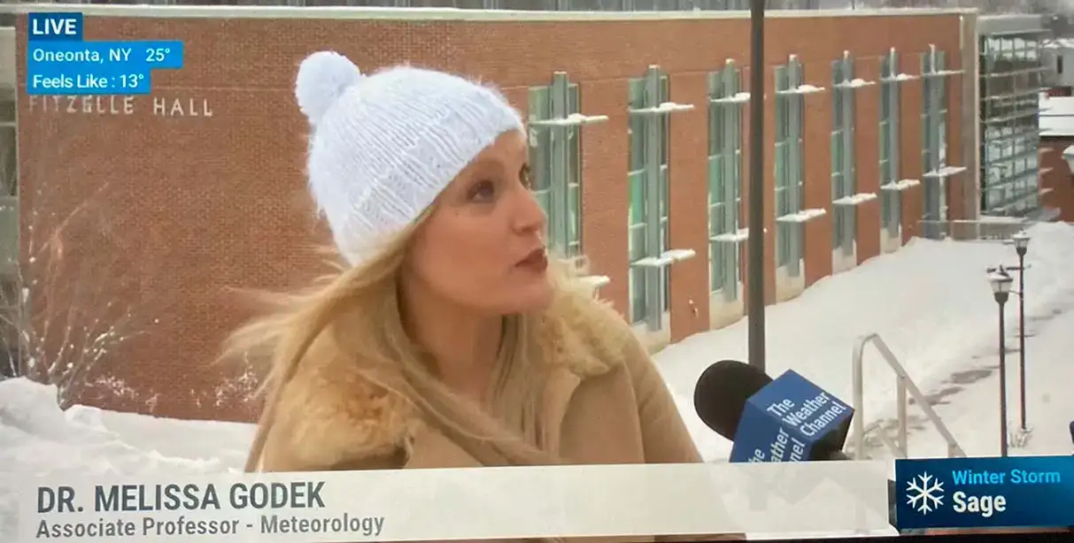Dr. Melissa Godek interviewed by The Weather Channel's Justin Michaels about the March 2023 Nor'Easter in front of Fitzelle Hall.