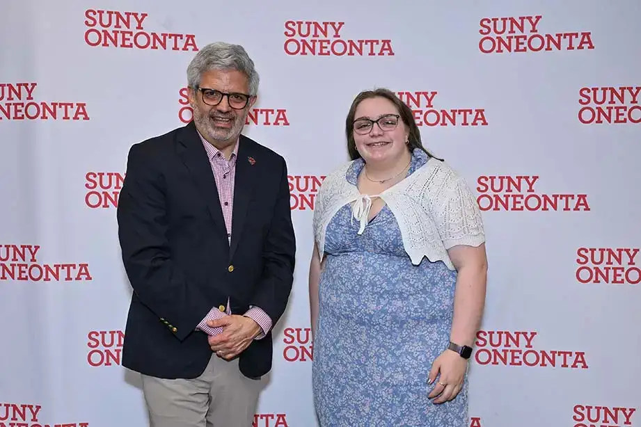 SUNY Oneonta President Dr. Alberto Cardelle poses with the 2026 award recipient.