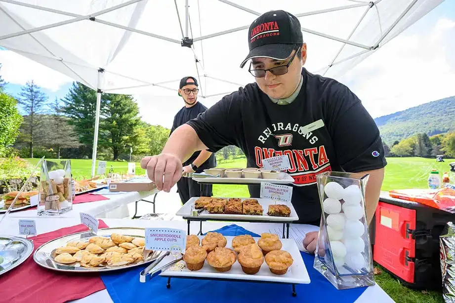 Volunteers put out snacks at the Red Dragon Open.