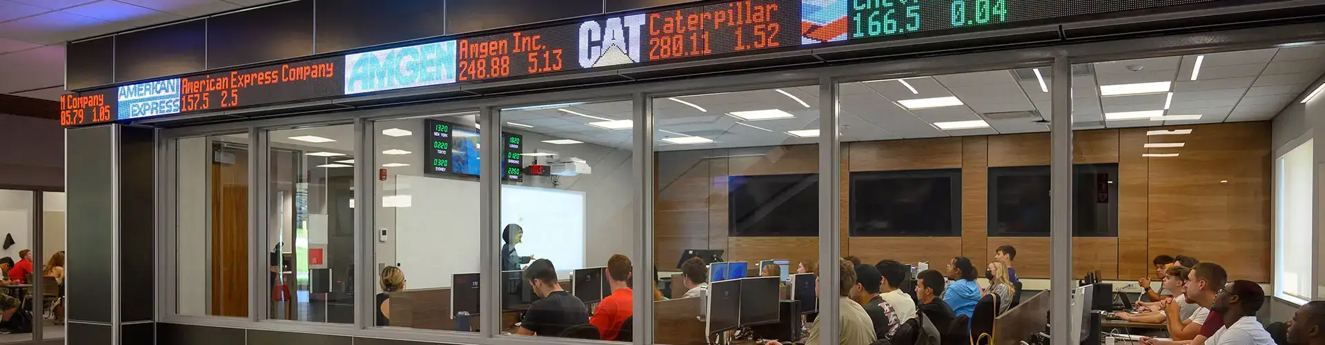 Stock ticker scrolls above the windows of the Bloomberg Room.