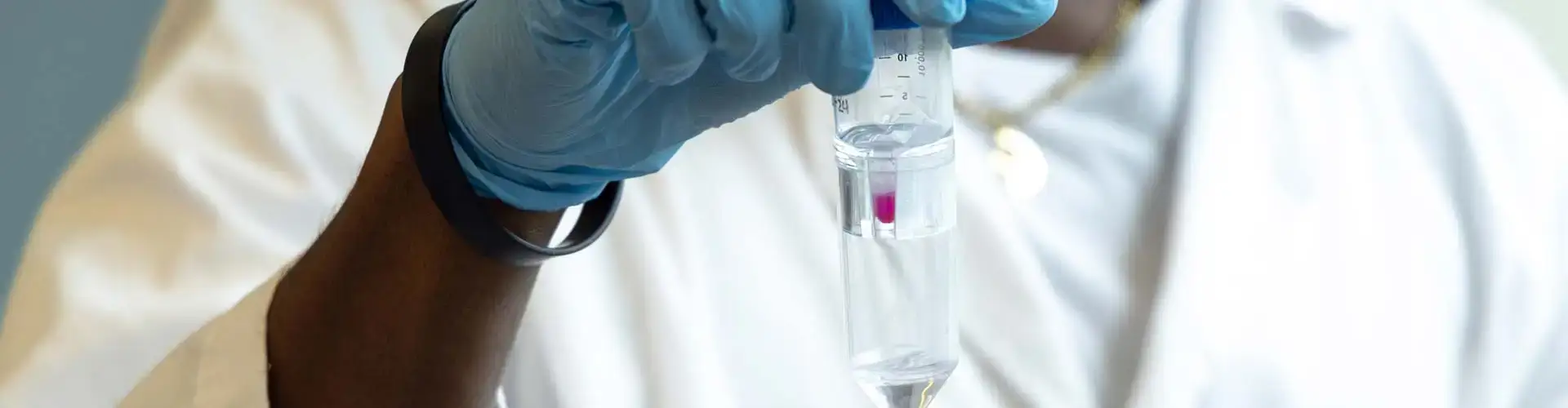 Chemistry student examines a chemical solution