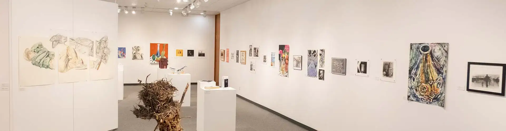 Juried Student Show artworks on display in the gallery.