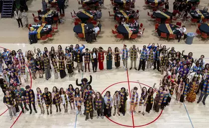Students participate in the Kente Graduation Celebration.