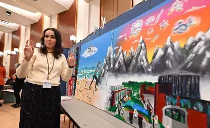 Art student presenting at the Student Research & Creative Activity Showcase