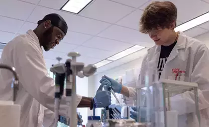 Students in the lab participate in the International Genetically Engineered Machine competition.