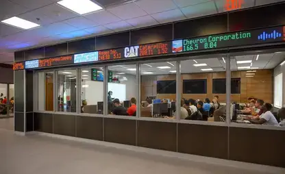 Stock ticker scrolls above the windows of the Bloomberg Room.