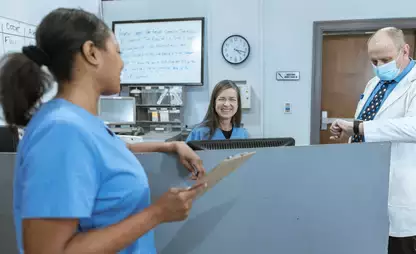 3 people in a health care setting