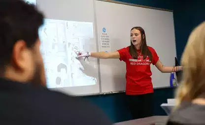 An English major discusses material during the Common Read Conference.