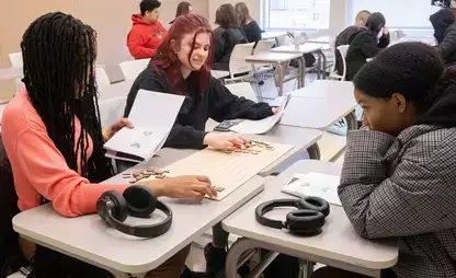 Students play Rithmomachia, a medieval mathematics board game