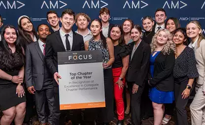 OnMark Marketing Club students pose for a group photo with their Top Chapter of the Year recognition.