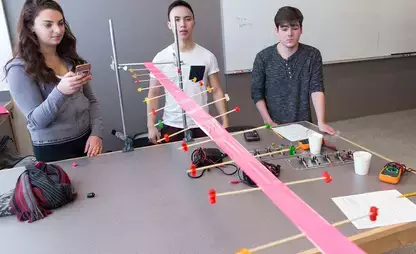 Students learn about wave motion by building a “Jelly Belly Wave Machine.”