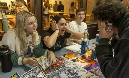 Students involved in WONY, the campus radio station, recruit members at the annual Club eXpo