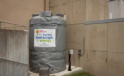 One of the Grind2Energy tanks behind a dining hall