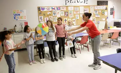Exercise student working with youth