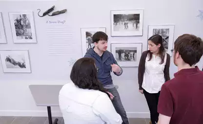 Museum Studies students discuss their exhibit designs during a critique.