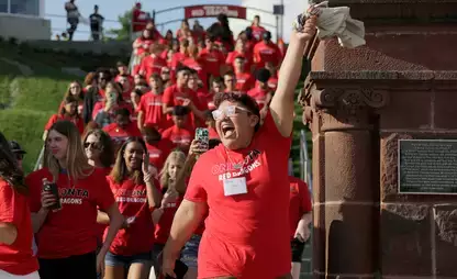 Incoming first year students celebrate the Pass Through the Pillars tradition