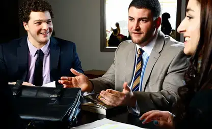 Teammates discuss their participation in the Federal Reserve Challenge