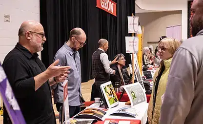 Faculty interacting with prospective students during our annual Fall Open House