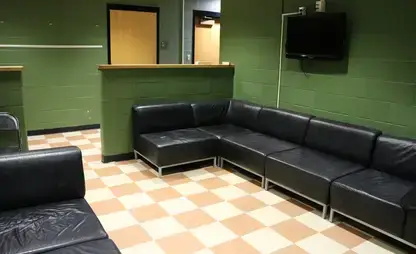 The main theatre department green room, equipped with couches and other amenities.