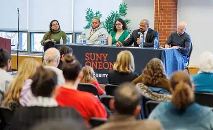 The panel at the Making "The Dream" A Reality: Dr. Martin Luther King's Vision for An Inclusive Society even speaks to the audience.