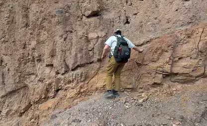 Student exploring geologic features during the Death Valley field trip.