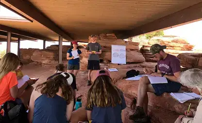 Students take part in an outdoor class during the Rocky Mountain trip.