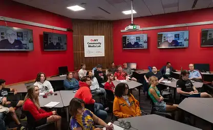 Students in the community media lab speak virtually with Sal Paolantonio.