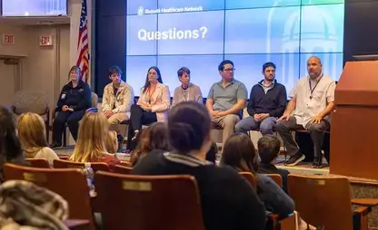 Member so a panel discussion sit on stage at the Basset Career Exploration forum.