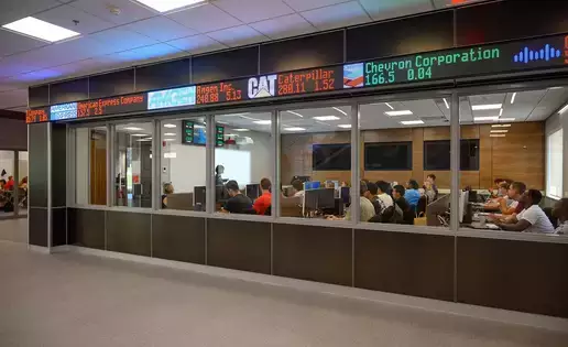 Stock ticker scrolls above the windows of the Bloomberg Room.