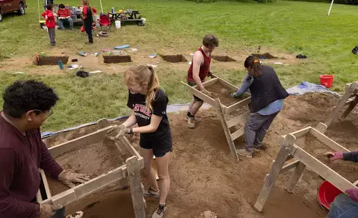 Students learn archaeology field techniques