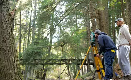Students review mapping tools during an earth sciences field study class