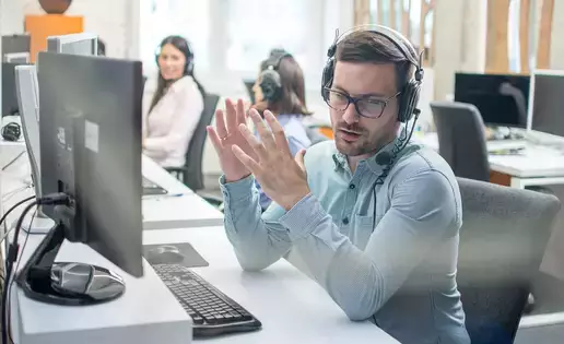 IT Customer support representative taking a call