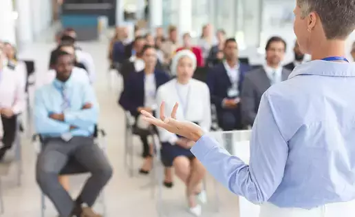 Individual leading a business seminar