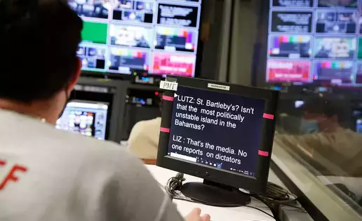 A media studies student reviews teleprompter settings