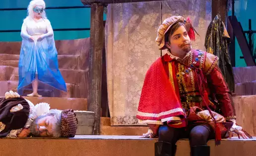 Theatre student in costume on the set of The Tempest