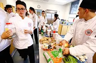Students preparing food.