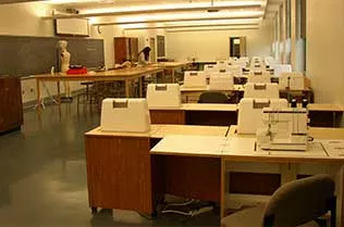 Rows of sewing machines in the lab for fashion.