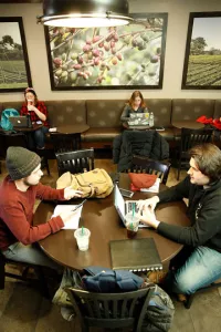 Students studying at the Starbucks at Hunt Union.