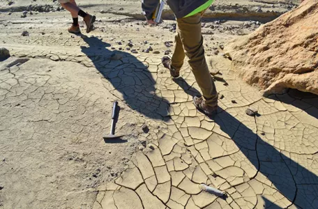 Students using tools to study the floor of the Bad Lands