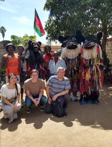 Group of faculty and students with tribesman in Zimbabwe