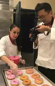 JP and Julia working in kitchen