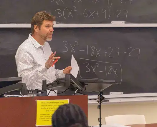Toke teaching summer academy students Math