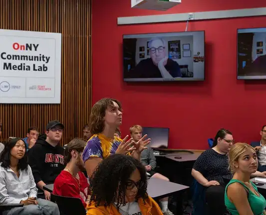 Students in the community media lab speak virtually with Sal Paolantonio.