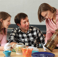 people studying museum pieces